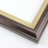 This solid wood frame features an elegant curve-and-scoop profile that draws the eye inward.  The outer edge maintains the natural wood grain, and slightly distressed gold foil on the inner lip adds a subtle antique finish. The outside rim is an unobtrusive black.

1.75 " width: suitable for both medium and large images.